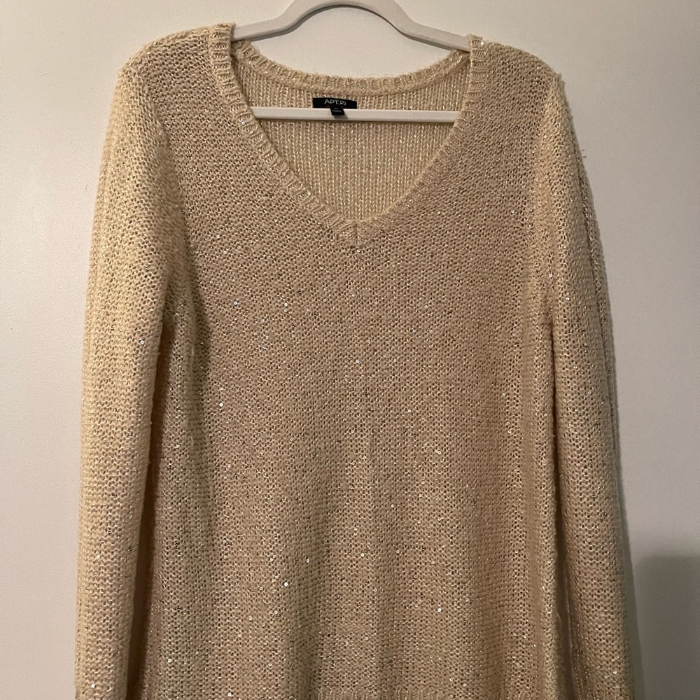 Gorgeous sparkle covered comfy sweater. Super cute with jeans and boots.